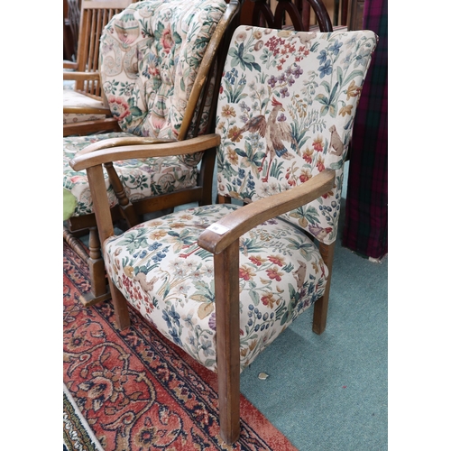 96 - A mid 20th century beech framed rocking chair, another 20th century rocking chair and a floral uphol... 