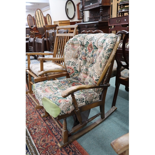 96 - A mid 20th century beech framed rocking chair, another 20th century rocking chair and a floral uphol... 