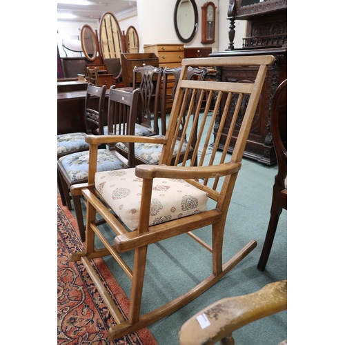 96 - A mid 20th century beech framed rocking chair, another 20th century rocking chair and a floral uphol... 