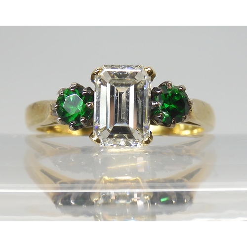 AN UNUSUAL DIAMOND AND DIOPSIDE RING