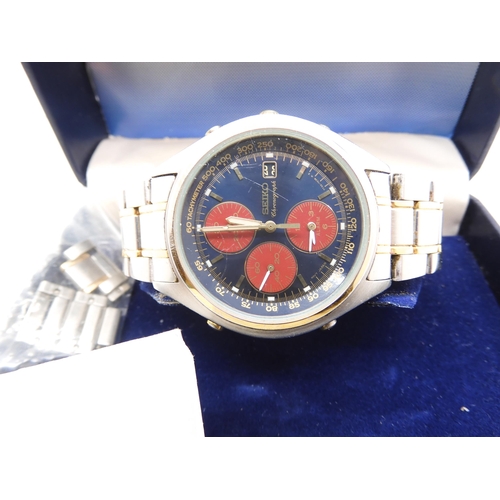 868 - A Seiko Chronograph, with three red dials on a metallic blue dial, stainless steel case and strap wi... 