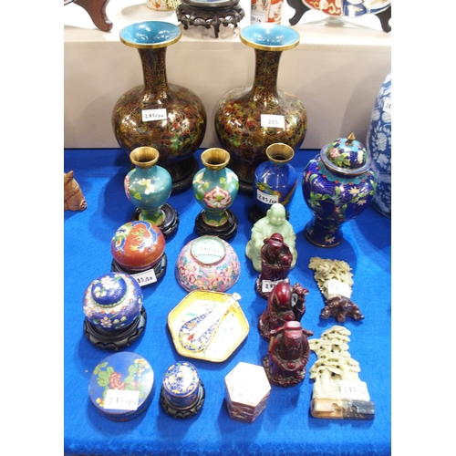 285 - A collection of cloisonne including a pair of vases, a smaller pair, lidded pots, bowl, two soapston... 