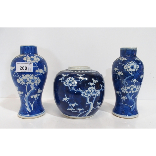 288 - Two similar prunus decorated vases and a ginger jar