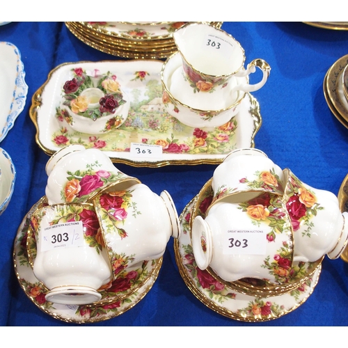 303 - A Royal Albert Old Country Roses tea and dinner wares comprising six cups, saucers and plates, dinne... 