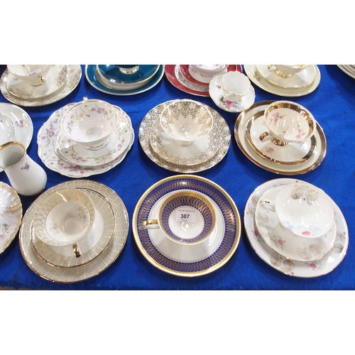 307 - A quantity of trios, mainly Austrian porcelain makes, together with a Royal Albert Harlequin set of ... 