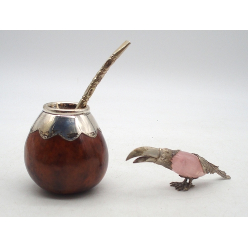 362 - A South American white metal topped Yerba mate gourd & bombilla, with a silver mounted quartz fi... 