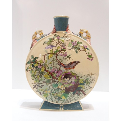 A Minton pottery moon flask, transfer printed and overpainted with a birds nest in a tree with butterflies
