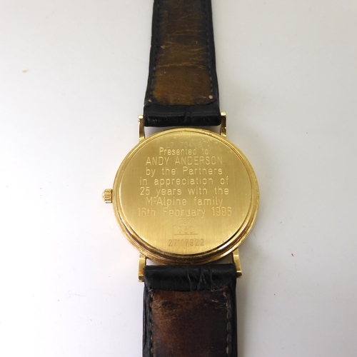 778 - An 18k gold Longines Quartz watch, with a black leather strap, with gold plated Longines buckle, ins... 