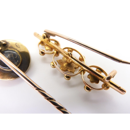 795 - A 15ct gold pearl set brooch length 3.9cm, weight 2.6gms, together with an enamel and pearl mourning... 