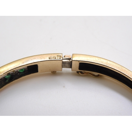 807 - A 9ct gold emerald and diamond bangle, together with a similar cz and emerald ring size N, weight to... 