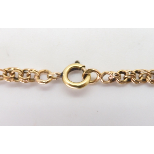 819 - A fancy yellow curb chain with continental marks, length 71cm, weight 18.2gms