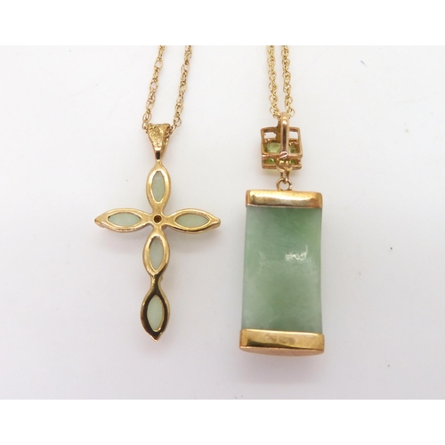 820 - A 9ct gold green hardstone cross set with a diamond accent, on a 50cm rope chain, a further 9ct gree... 