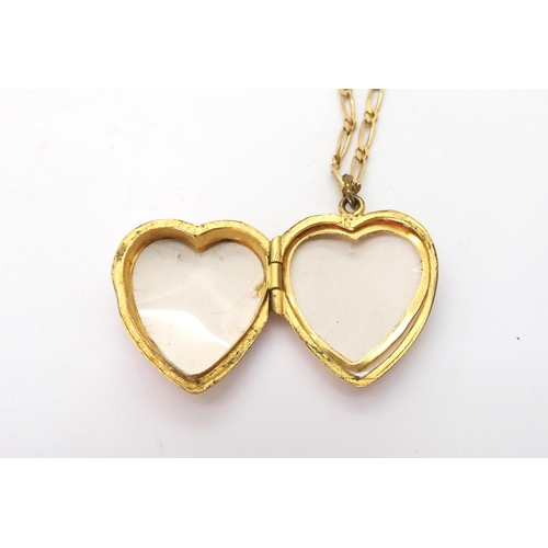 821 - A heart shaped back & front locket on a 9ct gold figaro chain, length 60cm, and a vintage yellow... 