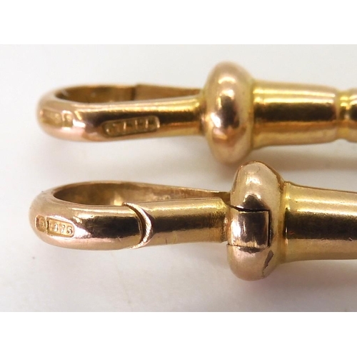 823 - A 9ct gold long and short link double fob chain, hallmarked to every link, the 'T' bar and both clas... 