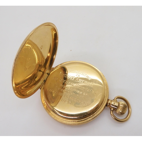 828 - An 18ct gold full hunter pocket watch, diameter 5cm, the inner dust cover inscribed with the date 19... 