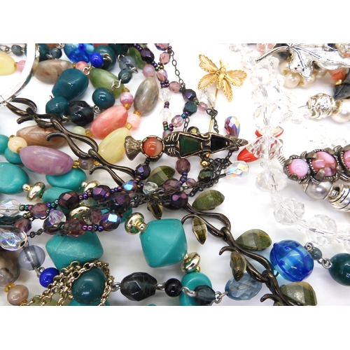 877 - A collection of vintage costume jewellery to include items by Miracle etc