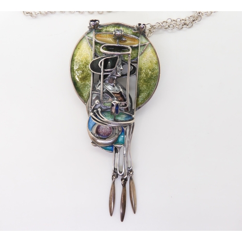 880 - A silver and enamel pendant in the style of Margaret MacDonald, designed By Pat Cheney for The Glasg... 