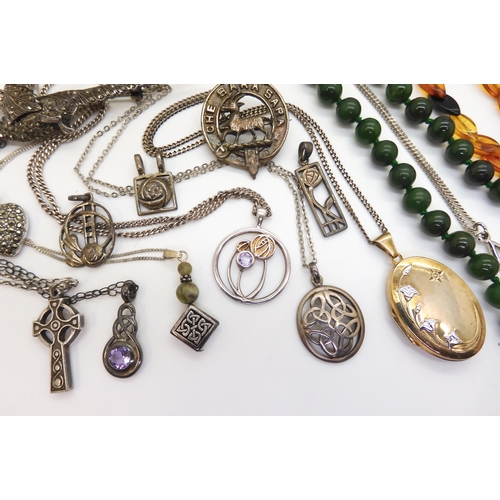 889 - A collection of silver and costume jewellery to include, amethyst, green hardstone and coral beads, ... 
