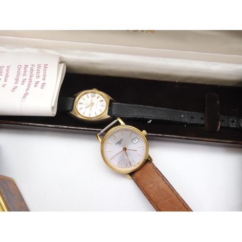 893 - A 9ct gold gents Record watch inscribed verso with the date 1959, a ladies Tissot watch, a ladies Ma... 