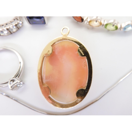 903 - A 9ct gold cameo pendant, weight 6gms, three pendants, a pair of earrings and a bangle all by Hot Di... 