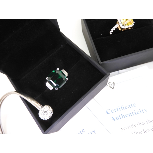 910 - Five pieces of jewellery set with 'Tru-Diamonds' simulated diamonds with certificated, two silver pa... 