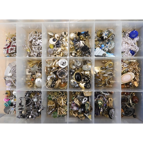 913 - A large collection of vintage brooches, earrings bangles and beads