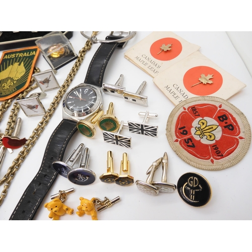 914 - A carved horn deer brooch, a grouse foot brooch, vintage Scouting badges, a Swatch Irony watch, and ... 