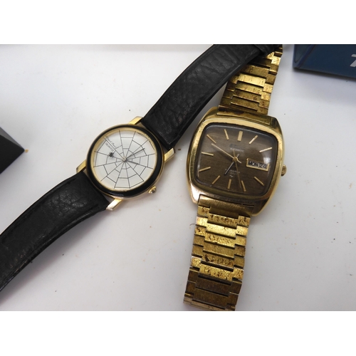 919A - A retro Tissot digital watch, a Seiko stopwatch, a Cyma Amic alarm clock, a Seiko automatic KS and a... 