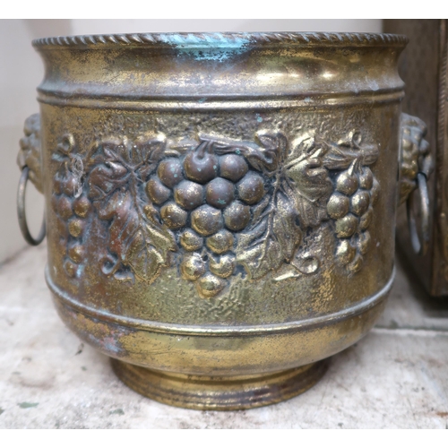 10 - A pair of late Victorian brass planters with grape on the vine motifs and lion masque handles, brass... 