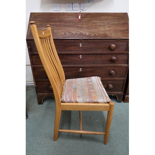 109A - A contemporary Ercol elm and beech dining suite comprising extending dining table, 74cm high x 151cm... 