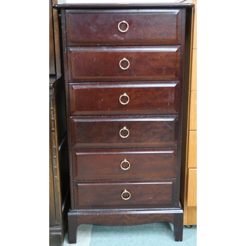 114 - A mid 20th century Stag chest of six drawers, 99cm high x 53cm wide x 47cm deep and an Ercol elm and... 