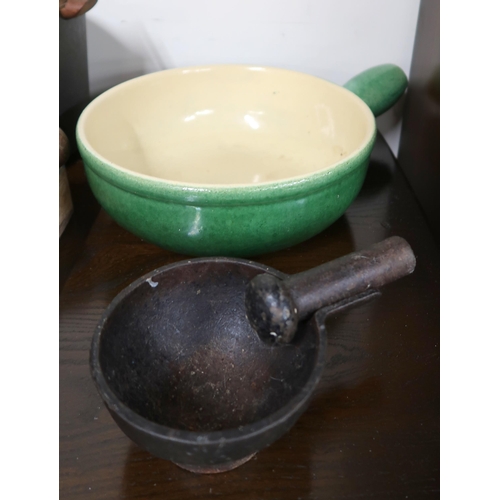 116 - A mixed lot of cook wares to include Littala Sarpaneva cast iron casserole, Danish enamelled cast ir... 