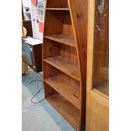 124 - A 20th century outback furniture graduating open bookcase in the form of a row boat, 205cm high x 90... 