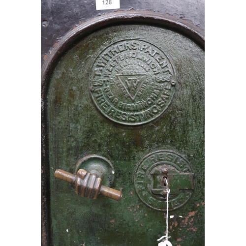 128 - A Victorian cast iron Withers patent fire resisting safe with fitted interior with two drawers (thou... 