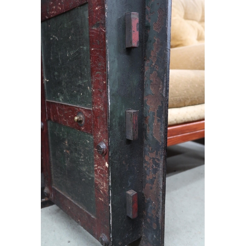 128 - A Victorian cast iron Withers patent fire resisting safe with fitted interior with two drawers (thou... 