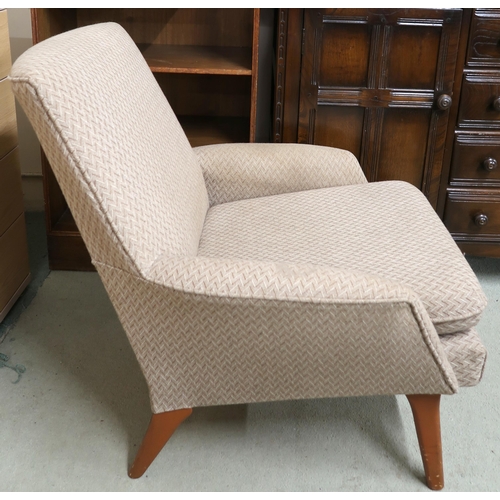 131 - A mid 20th century grey upholstered armchair on shaped teak supports, 79cm high x 70cm wide x 80cm d... 