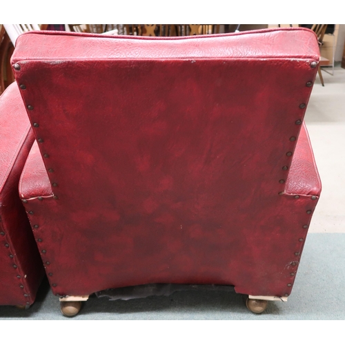 138 - A pair of early 20th century art deco red Rexine upholstered club armchairs, 80cm high x 74cm wide x... 