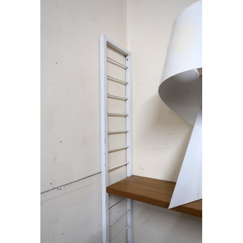 148 - A mid 20th century Staples Ladderax modular shelving system with four uprights and ten shelves, 201c... 