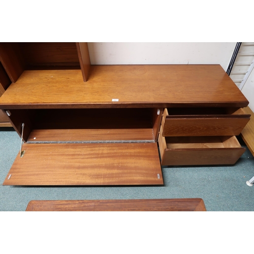 151 - A mid 20th century teak media unit with single cabinet door over three open shelves on base with fal... 