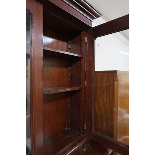 162 - A Victorian mahogany secretaire bookcase with moulded cornice over pair of glazed doors over fitted ... 