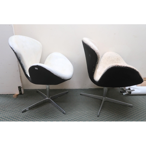 167 - A contemporary Arne Jacobsen for Fritz Hansen swivel chair and another swivel chair in the manner of... 