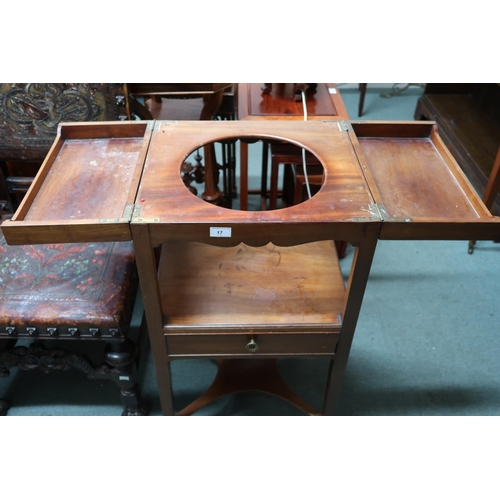 17 - A 19th century mahogany wash stand with twin hinged top over single drawer on square tapering suppor... 