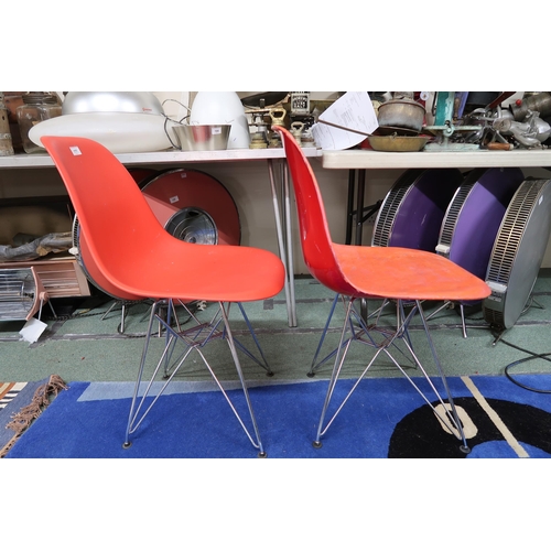 177 - A pair of after Herman Miller for Eames shell chairs, 80cm high