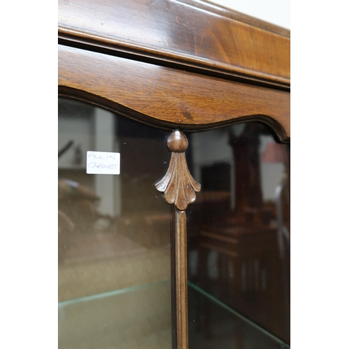 2 - A 20th century mahogany glazed display cabinet with central bow fronted cabinet door flanked by glaz... 