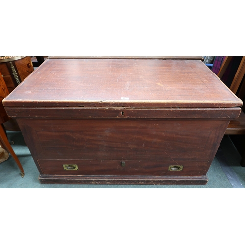 21 - A large Victorian pine blanket chest with hinged top concealing internal candle store with two short... 