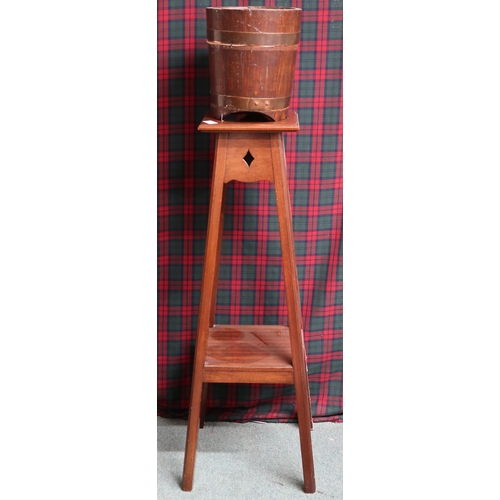 22 - An early 20th century mahogany two tier jardinière stand, 92cm high and a small coopered planter (2)