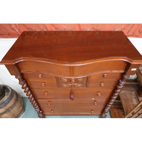 29 - A large late Victorian mahogany serpentine front chest of drawers with long frieze drawer over four ... 
