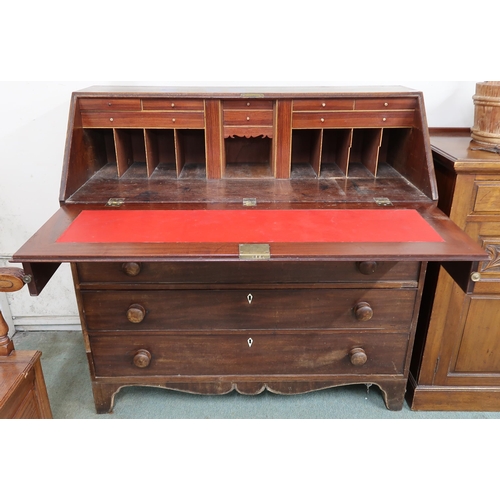 33 - A late Georgian mahogany fall front writing bureau with fitted writing compartment over four long dr... 