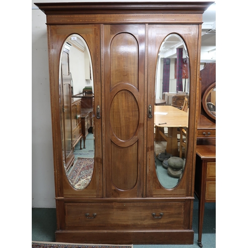 39 - A late Victorian mahogany and satinwood inlaid two piece bedroom suite comprising mirror doored ward... 