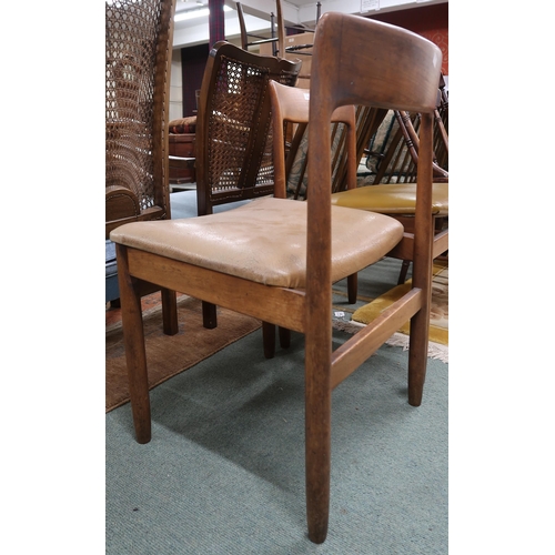 44 - A pair of mid 20th century John Herbert for Younger Ltd dining chairs with mustard vinyl seats on te... 